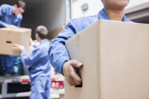 Professional flat removals team preparing a Holland Park apartment move