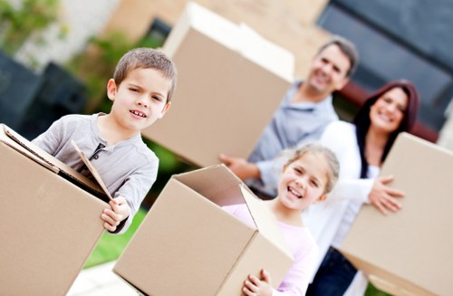 Careful loading of household furniture for a local Holland Park relocation