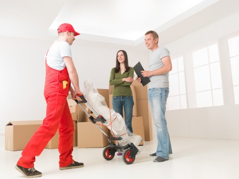 Fragile household belongings prepared for relocation in Holland Park