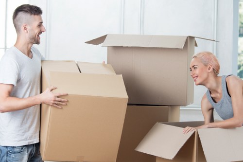 Local team collecting a sofa from a residential property